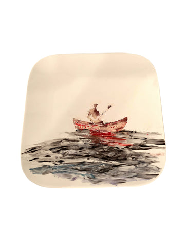 Assiette en porcelaine canoë sur lac