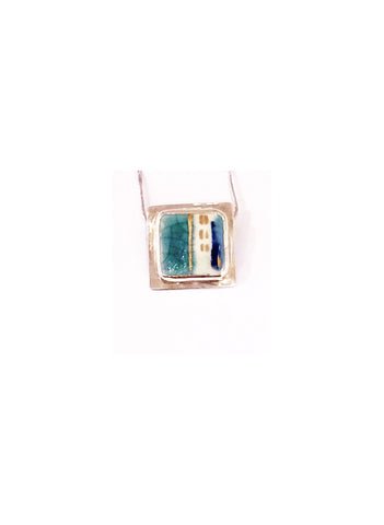 Pendentif turquoise lustre d'or